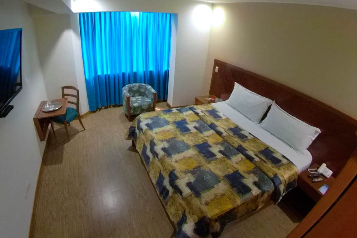 Blackout curtains, iron/ironing board, free WiFi, bed sheets