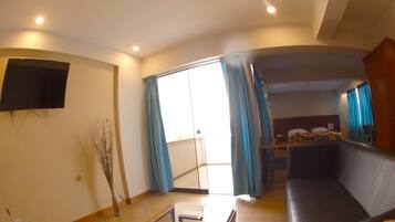 Blackout curtains, iron/ironing board, free WiFi, bed sheets