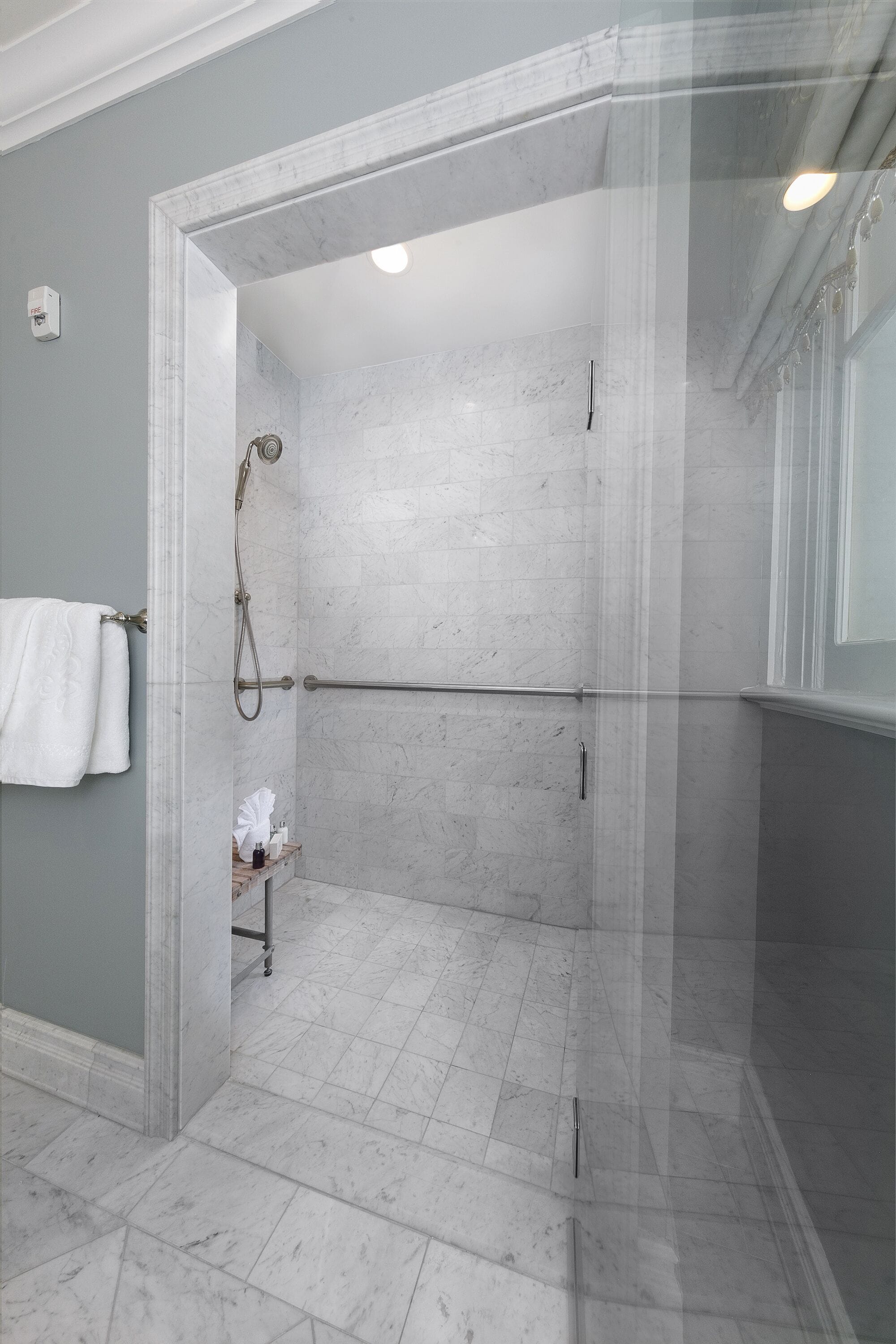 designer toiletries, hair dryer, bathrobes, slippers