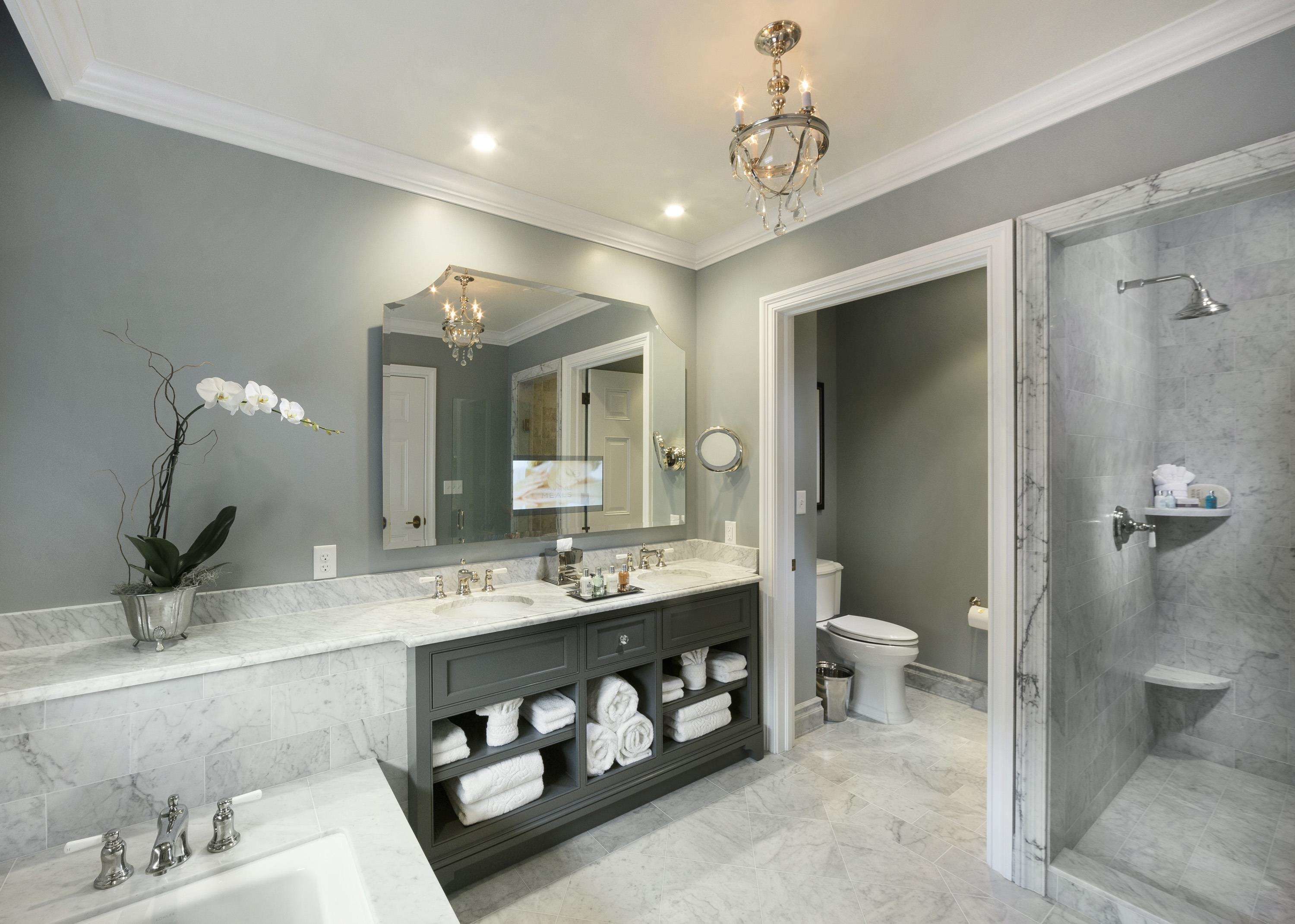 designer toiletries, hair dryer, bathrobes, slippers