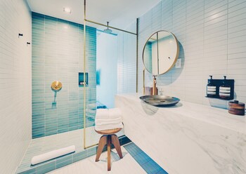 Room, Poolside | Bathroom | Designer toiletries, hair dryer, bathrobes, towels at South Congress Hotel