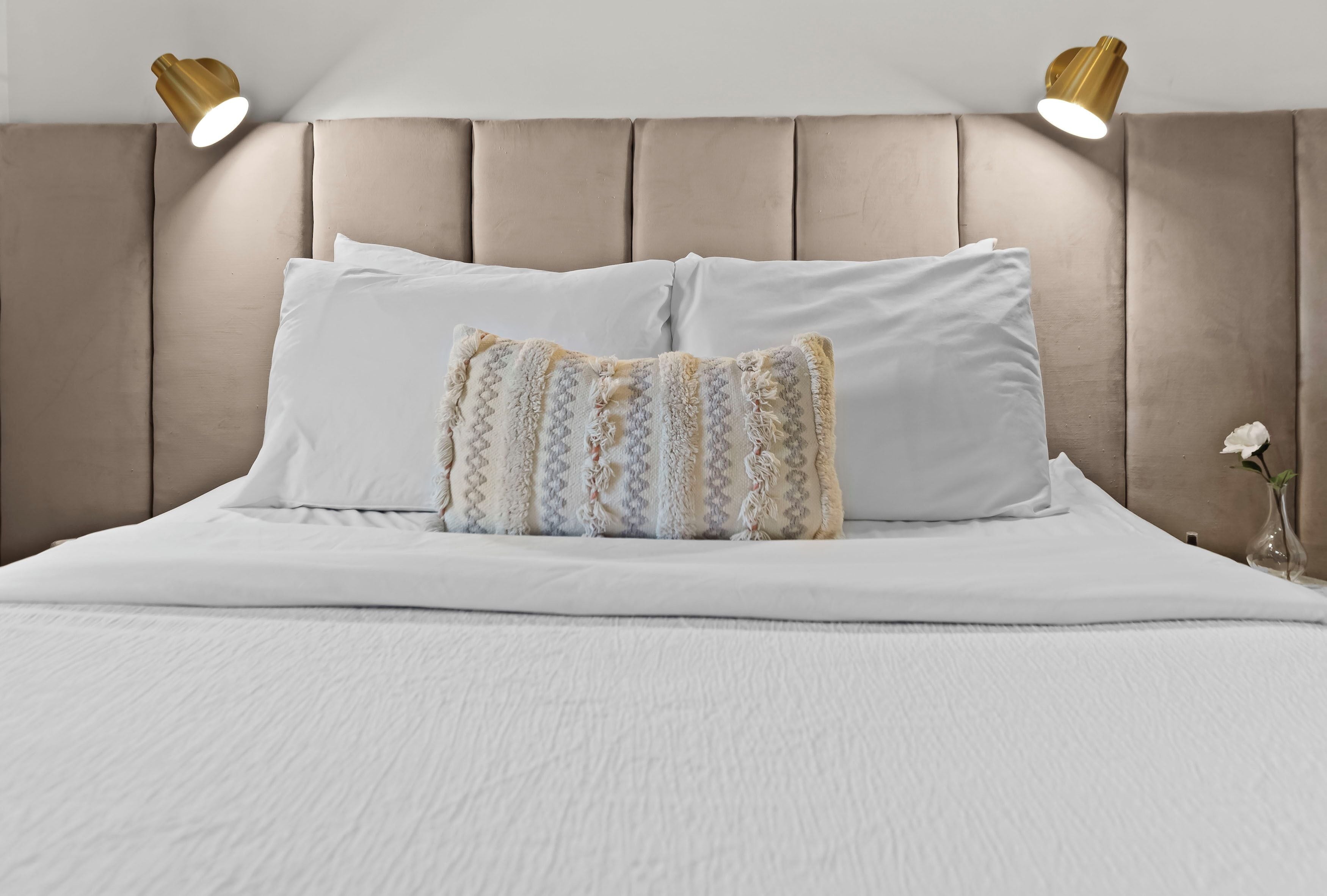 Premium bedding, minibar, blackout curtains, iron/ironing board