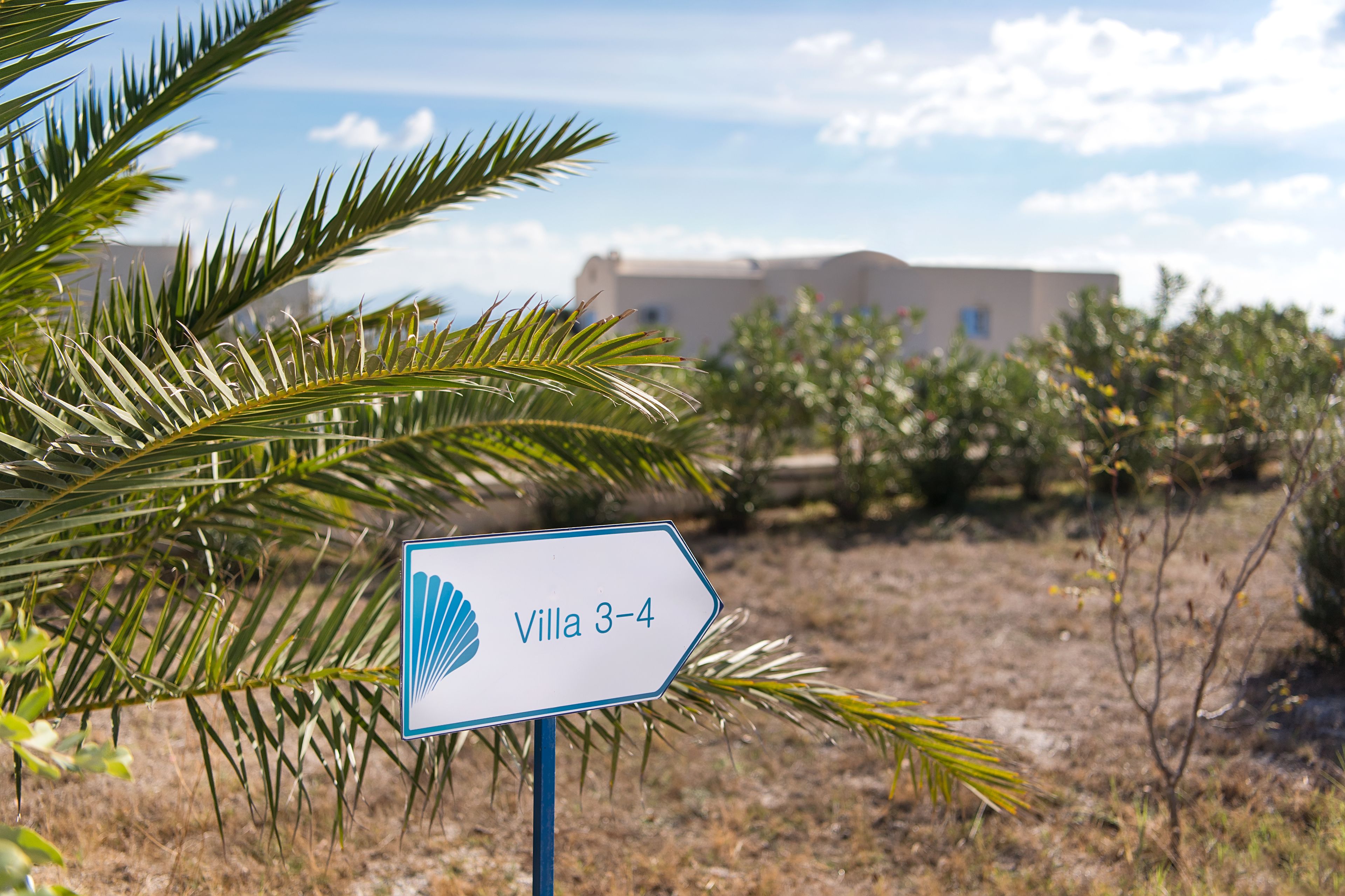 A sign indicating Villa 3-4.
