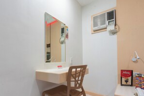 Chambre Deluxe, 1 grand lit | Coin séjour