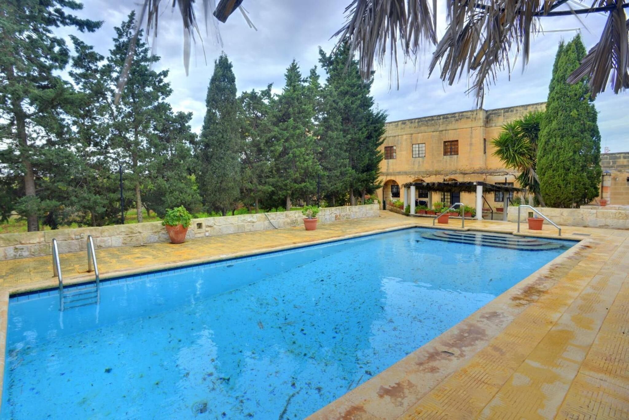 Outdoor pool, pool umbrellas, pool loungers