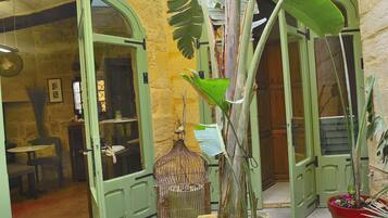 Junior Double Room, 1 King Bed, Ensuite, Courtyard Area | Terrace/patio
