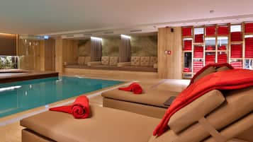 Indoor pool, open 10:00 AM to 10:00 PM, pool loungers