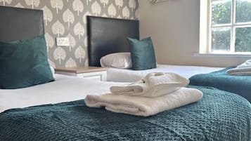 Desk, blackout curtains, free WiFi, bed sheets
