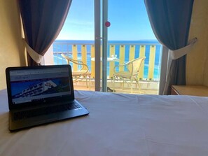 Standard Double or Twin Room, Balcony | In-room safe, desk, blackout drapes, soundproofing - Hôtel Le Beau Séjour (Saint-Raphael)