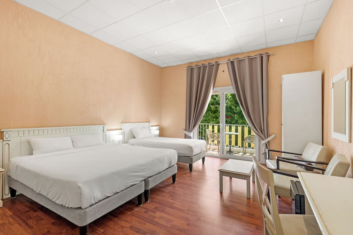 Family Room, Balcony | In-room safe, desk, blackout drapes, soundproofing