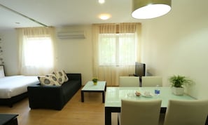 Silver One Bedroom Apartment | Living area