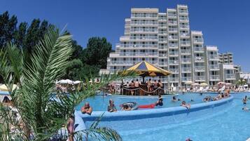 Seasonal outdoor pool, pool umbrellas, pool loungers