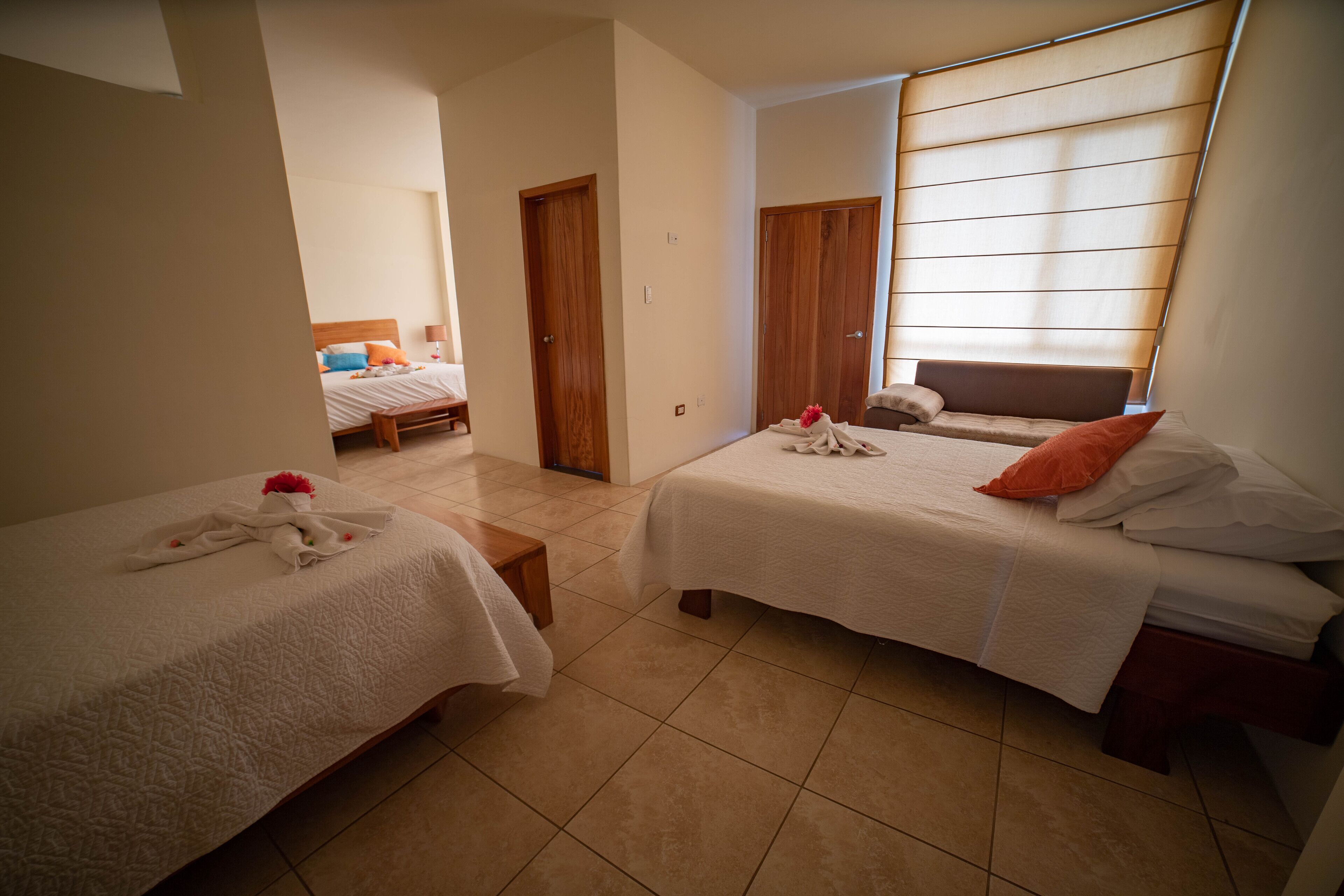 twin room, 2 queen beds, balcony, city view | in-room safe, desk, iron/ironing board, free cots/infant beds