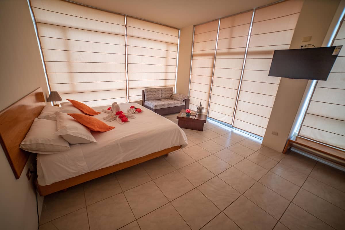 double room, 1 king bed, balcony, city view | in-room safe, desk, iron/ironing board, free cots/infant beds