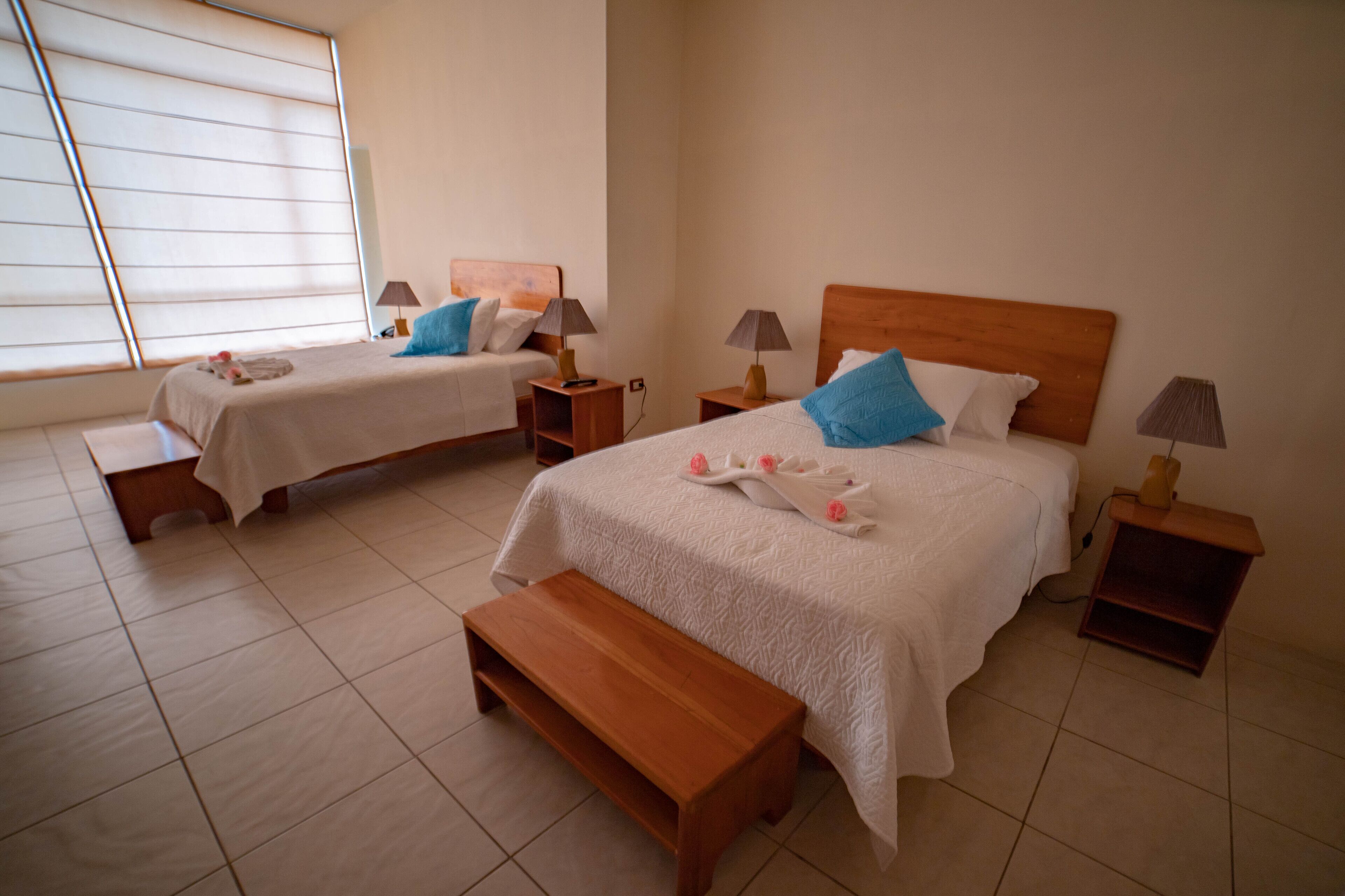 twin room, 2 queen beds, balcony, city view | in-room safe, desk, iron/ironing board, free cots/infant beds