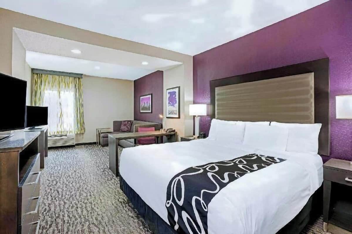 Premium bedding, desk, blackout drapes, iron/ironing board