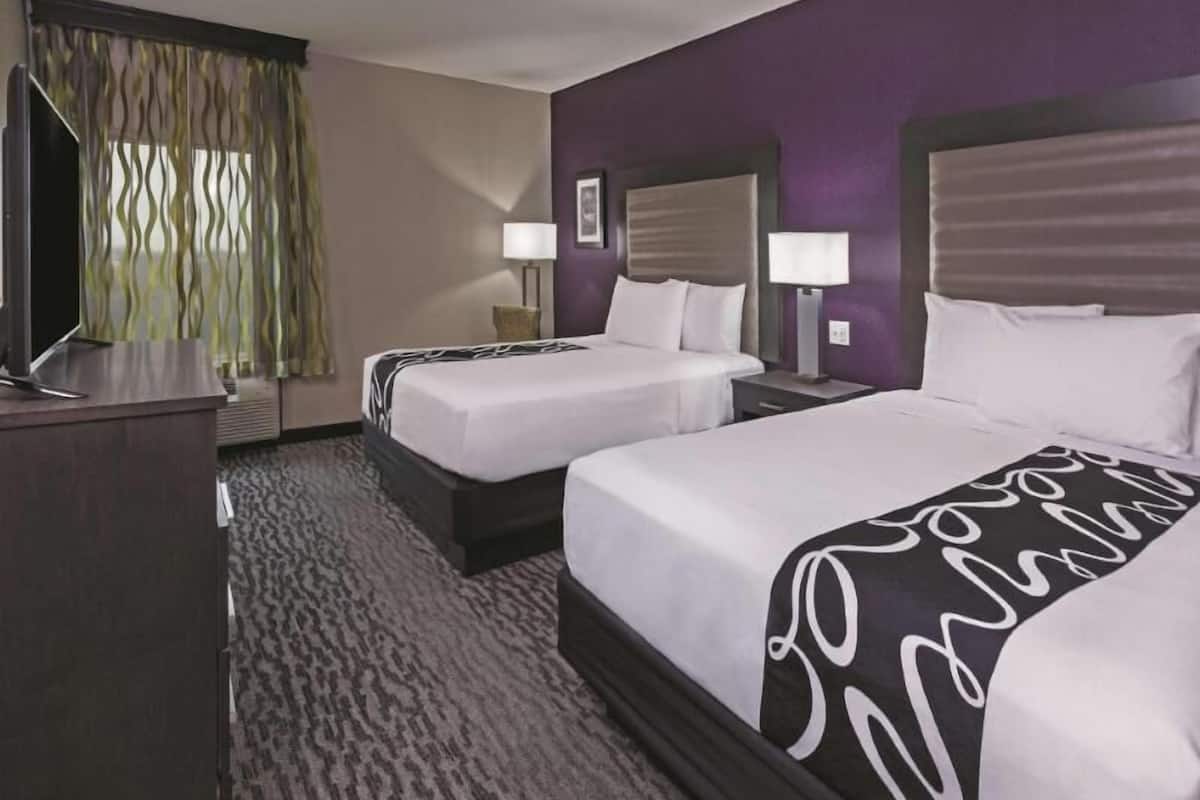Premium bedding, desk, blackout drapes, iron/ironing board