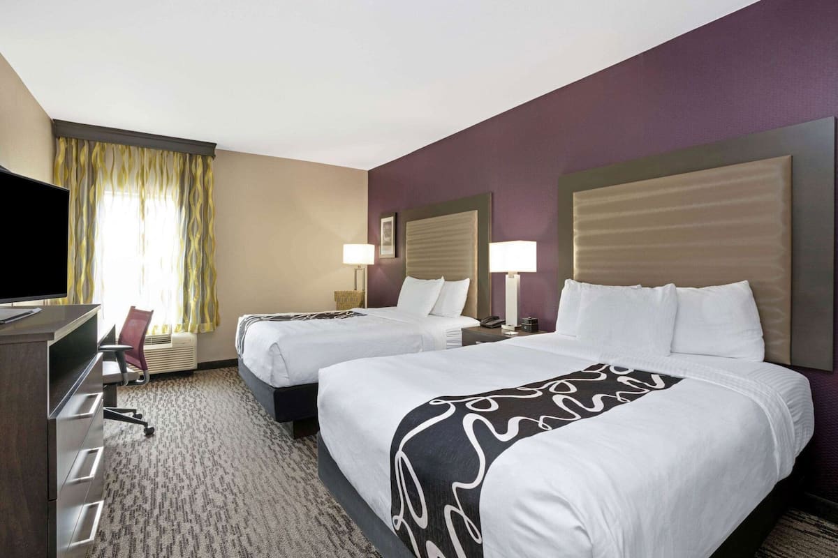 Premium bedding, desk, blackout drapes, iron/ironing board
