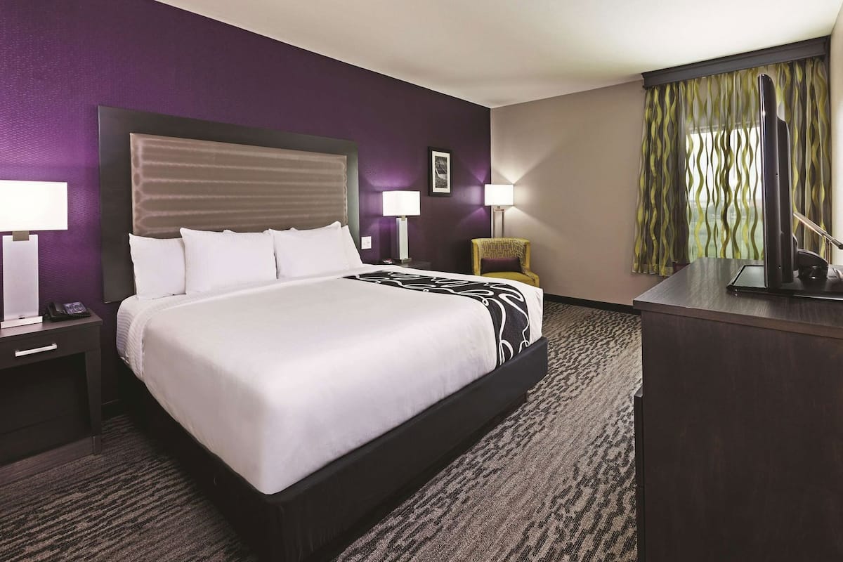 Premium bedding, desk, blackout drapes, iron/ironing board