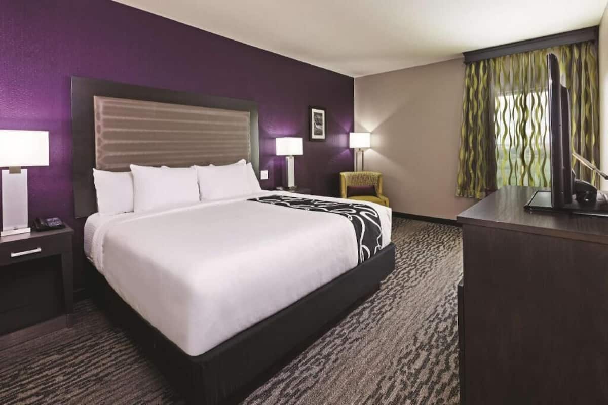 Premium bedding, desk, blackout drapes, iron/ironing board