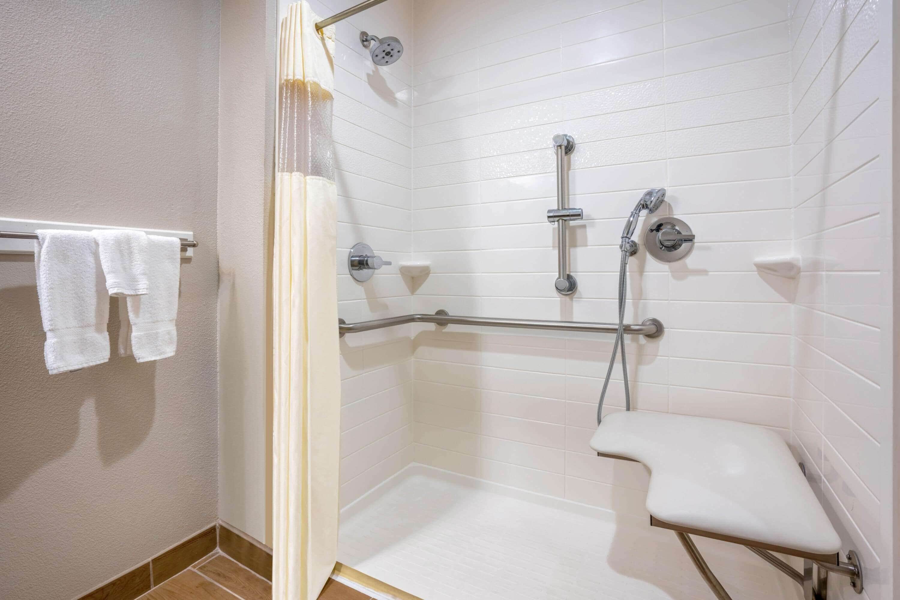 combined shower/bathtub, free toiletries, hair dryer, towels