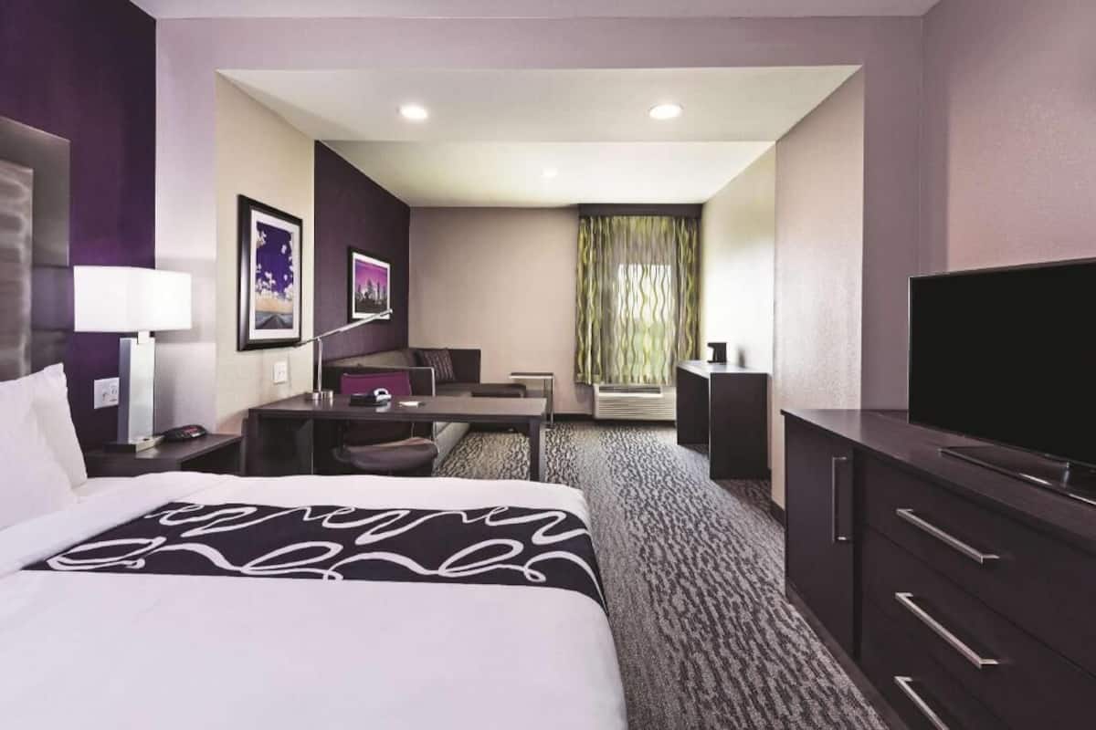 Premium bedding, desk, blackout drapes, iron/ironing board