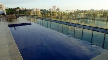 Outdoor pool, open 8:00 AM to 10:00 PM, pool loungers