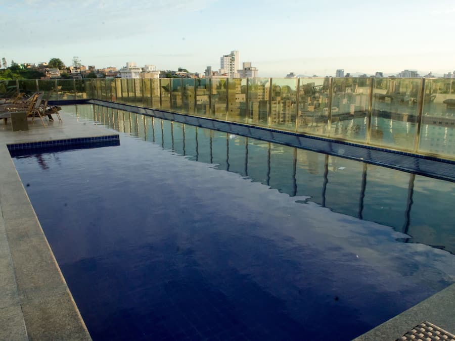 Outdoor pool, open 8:00 AM to 10:00 PM, pool loungers