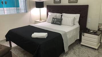 Quarto standard | 1 quarto, roupas de cama premium, frigobar, individualmente decorados