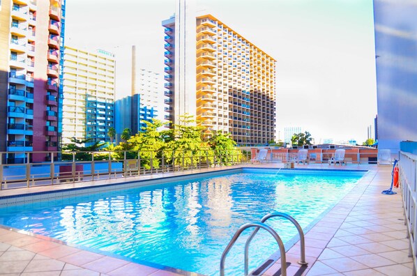 Outdoor pool, sun loungers