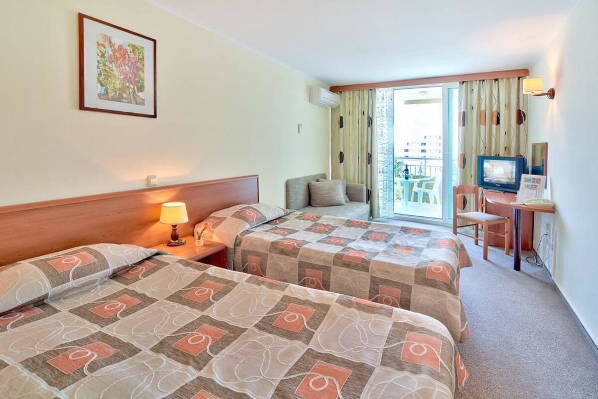 Minibar, desk, iron/ironing board, bed sheets
