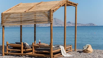 On the beach, free beach cabanas, sun-loungers, beach umbrellas