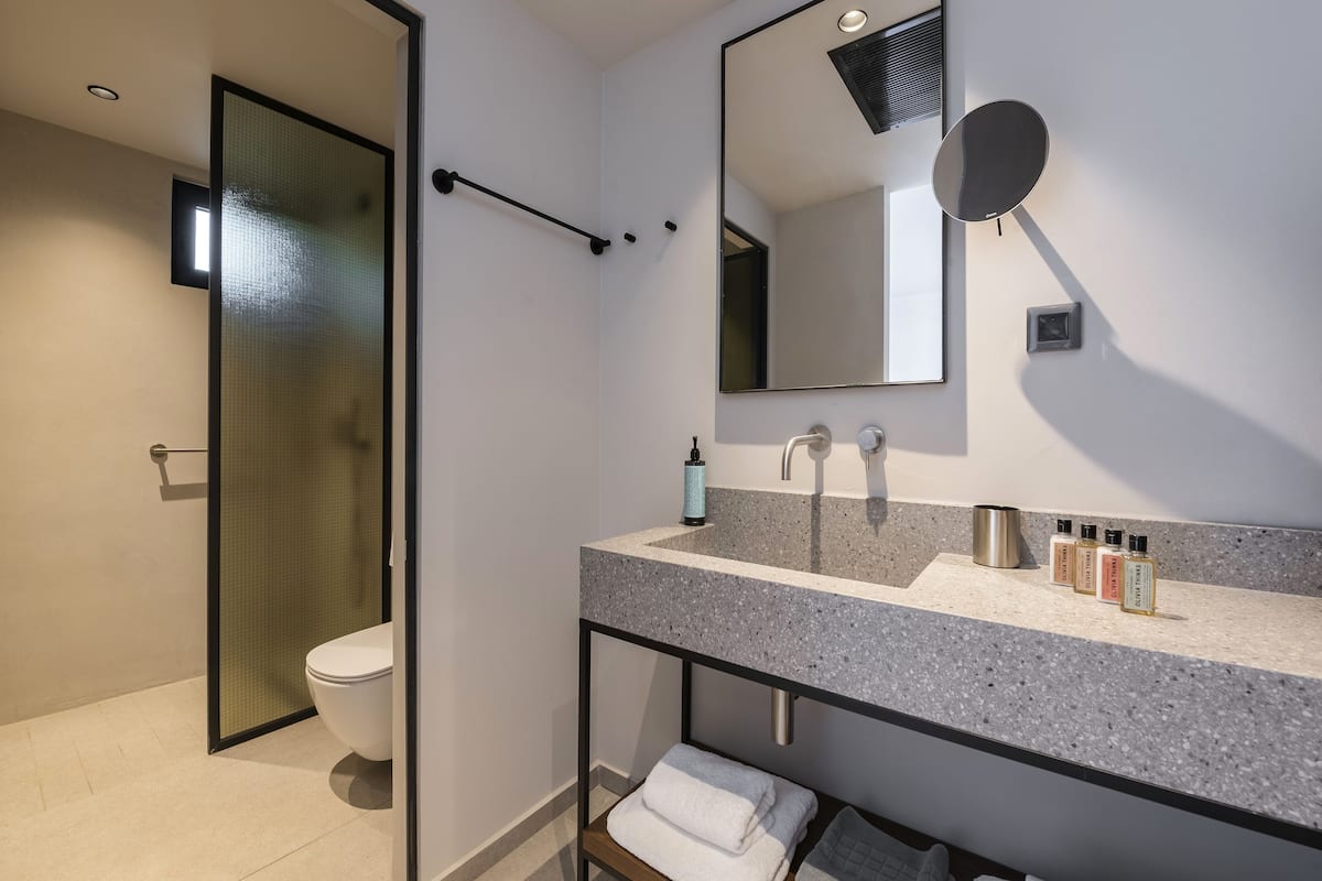 shower, eco-friendly toiletries, hair dryer, bathrobes