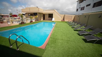 Outdoor pool, open 8 AM to 7 PM, sun loungers