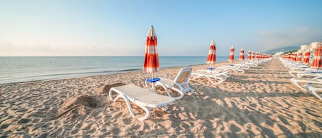 Free beach shuttle, sun-loungers, beach umbrellas