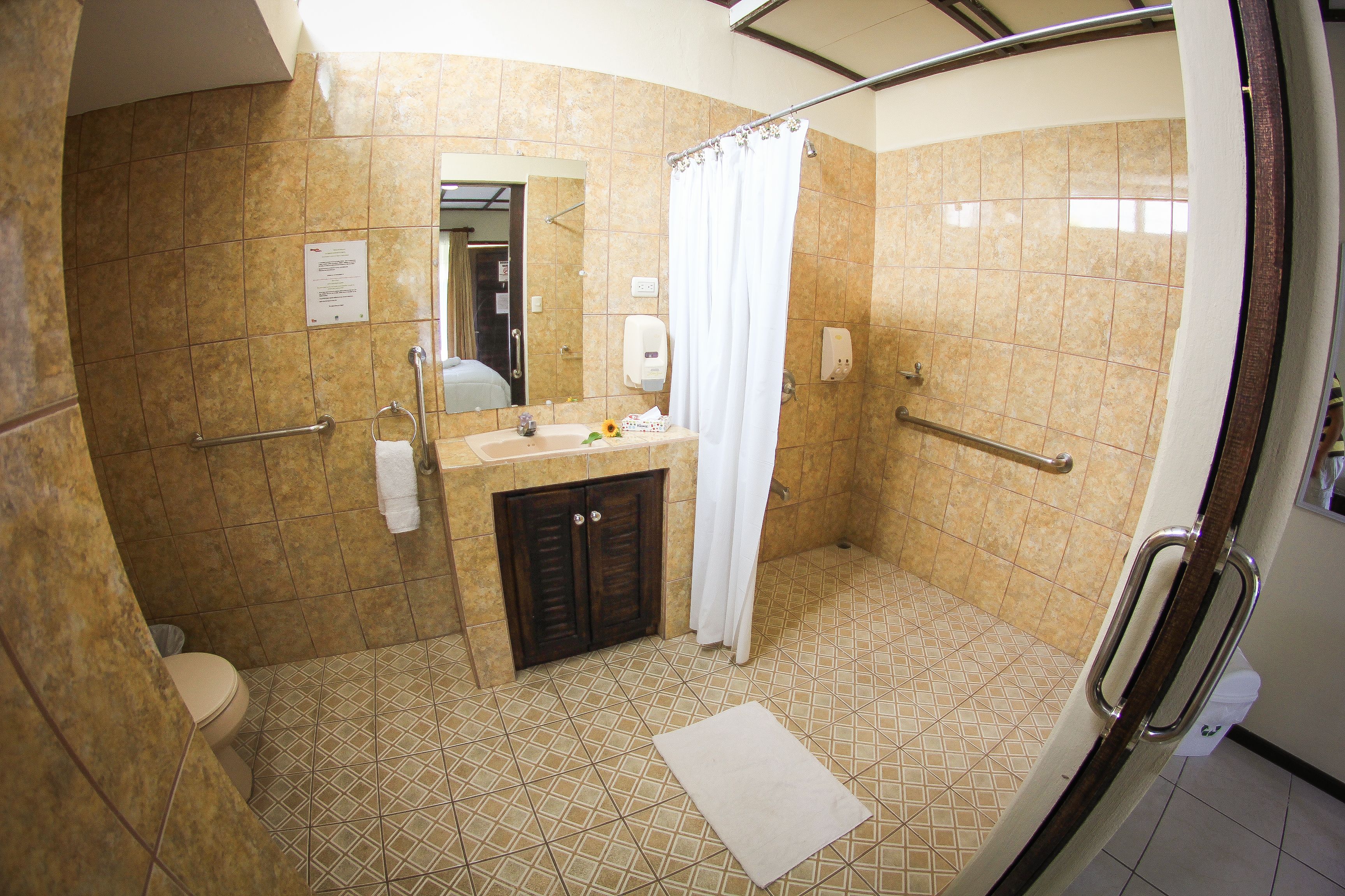 standard room, garden view | bathroom | shower, free toiletries, towels