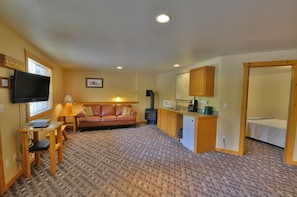 2 Bedroom Deluxe Cabin | Living room | Flat-screen TV