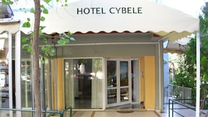 A hotel entrance with a glass door and a sign that reads "HOTEL CYBELE". - Hotel Cybele (Lykovrysi-Pefki)
