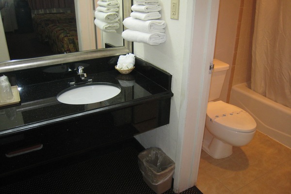 Standard Room, 2 Queen Beds | Bathroom | Combined shower/bathtub, free toiletries, hair dryer, towels