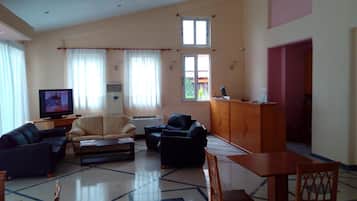 32-inch flat-screen TV with satellite channels, TV
