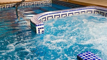 Indoor pool, seasonal outdoor pool, pool umbrellas, pool loungers