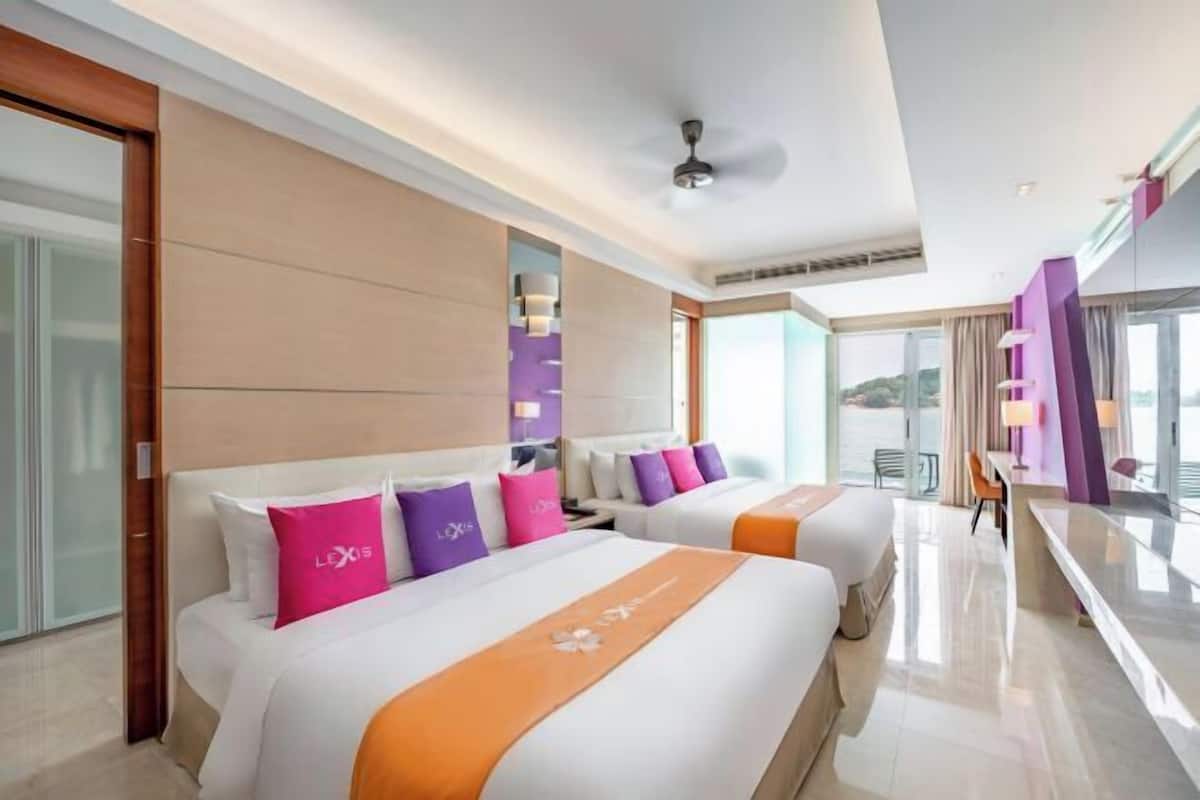 Premium bedding, down comforters, minibar, in-room safe