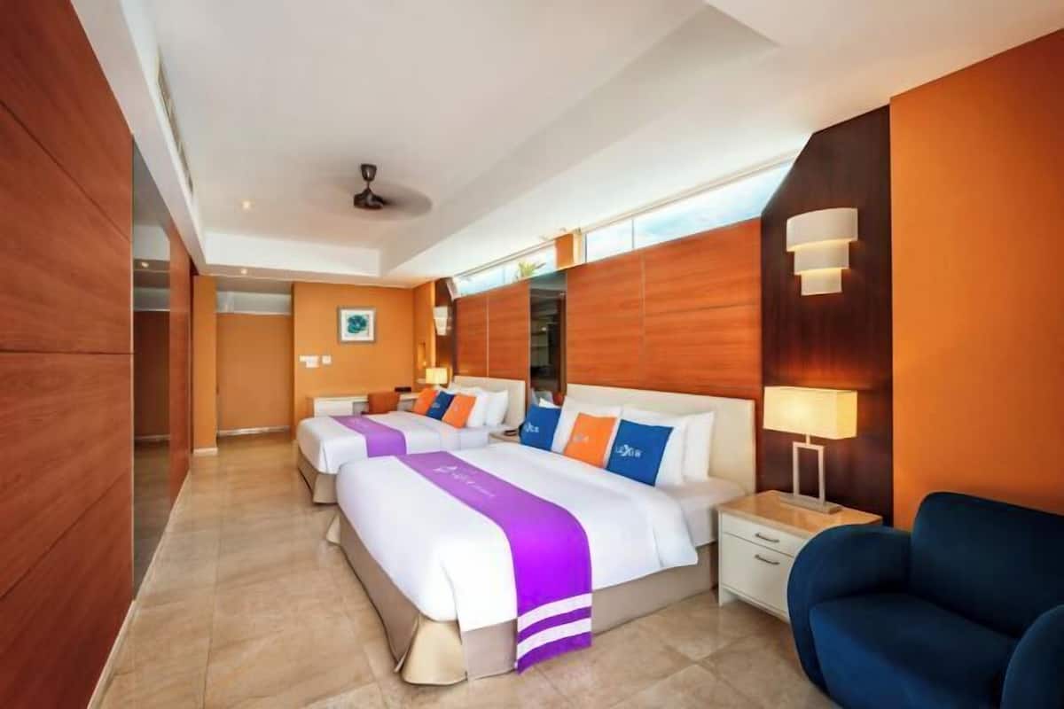 Premium bedding, down comforters, minibar, in-room safe