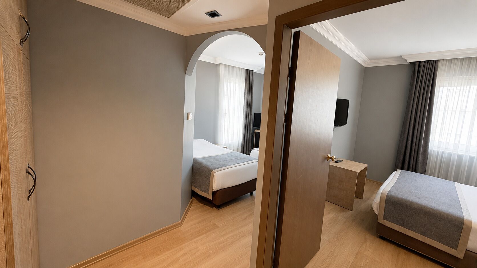 Family Room | Minibar, in-room safe, free WiFi, bed sheets