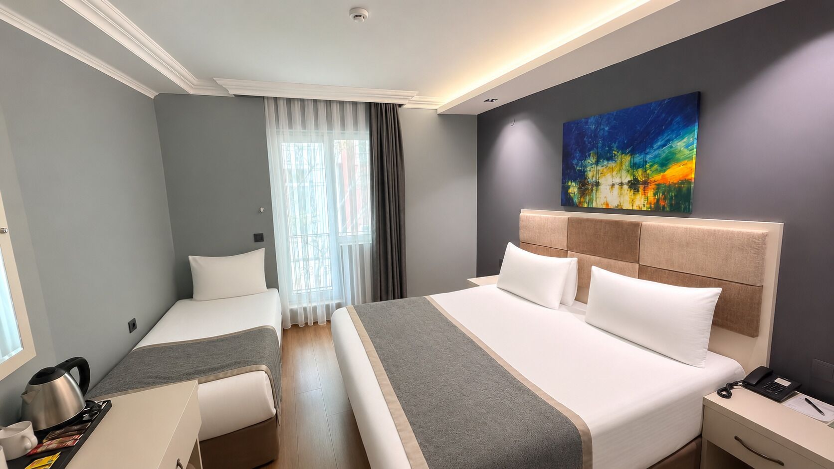 Deluxe Triple Room | Hypo-allergenic bedding, minibar, in-room safe, desk