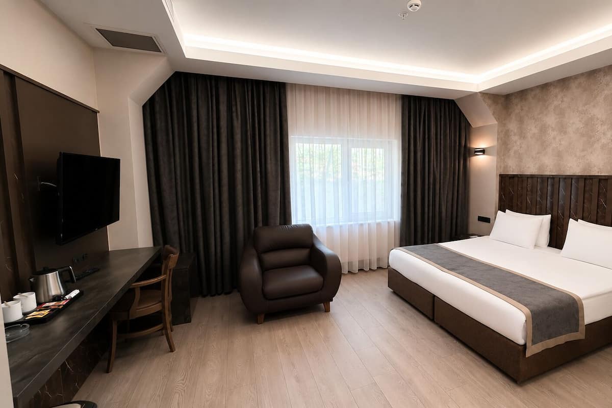 Habitació doble o amb dos llits individuals | Roba de llit hipoal·lergògena, minibar i caixa forta a l'habitació