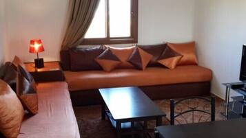 Appartement, 1 slaapkamer | Woonruimte | Een flatscreentelevisie