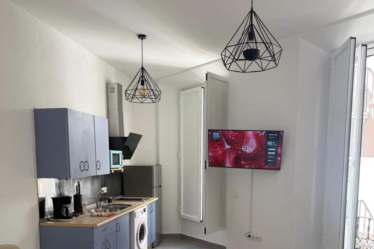 Apartment, 1 Bedroom | Living room | Flat-screen TV