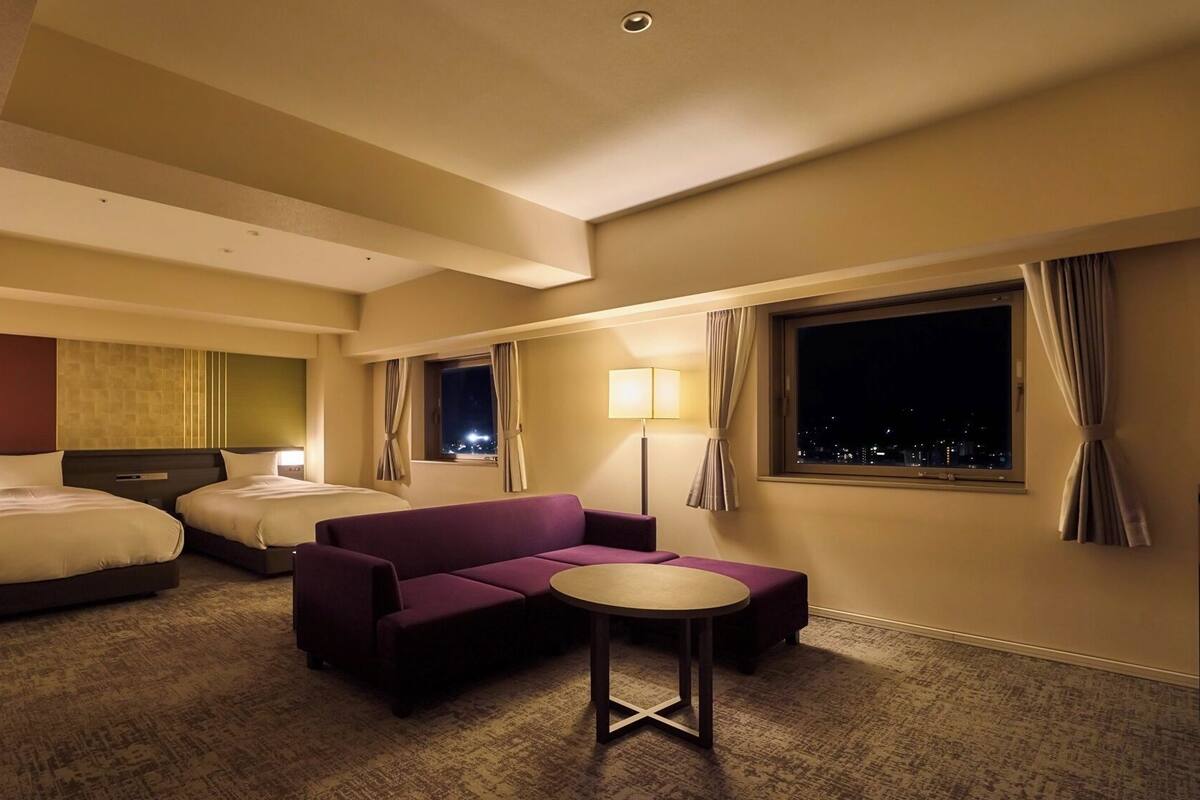 Habitación cuádruple ejecutiva, para no fumadores (Suite) | 1 habitación, decoración personalizada, muebles diferentes y escritorio