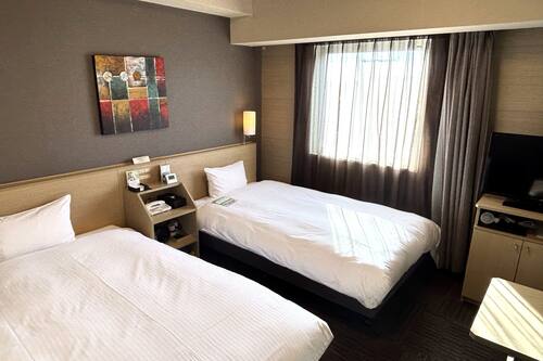 Down comforters, desk, free WiFi, bed sheets